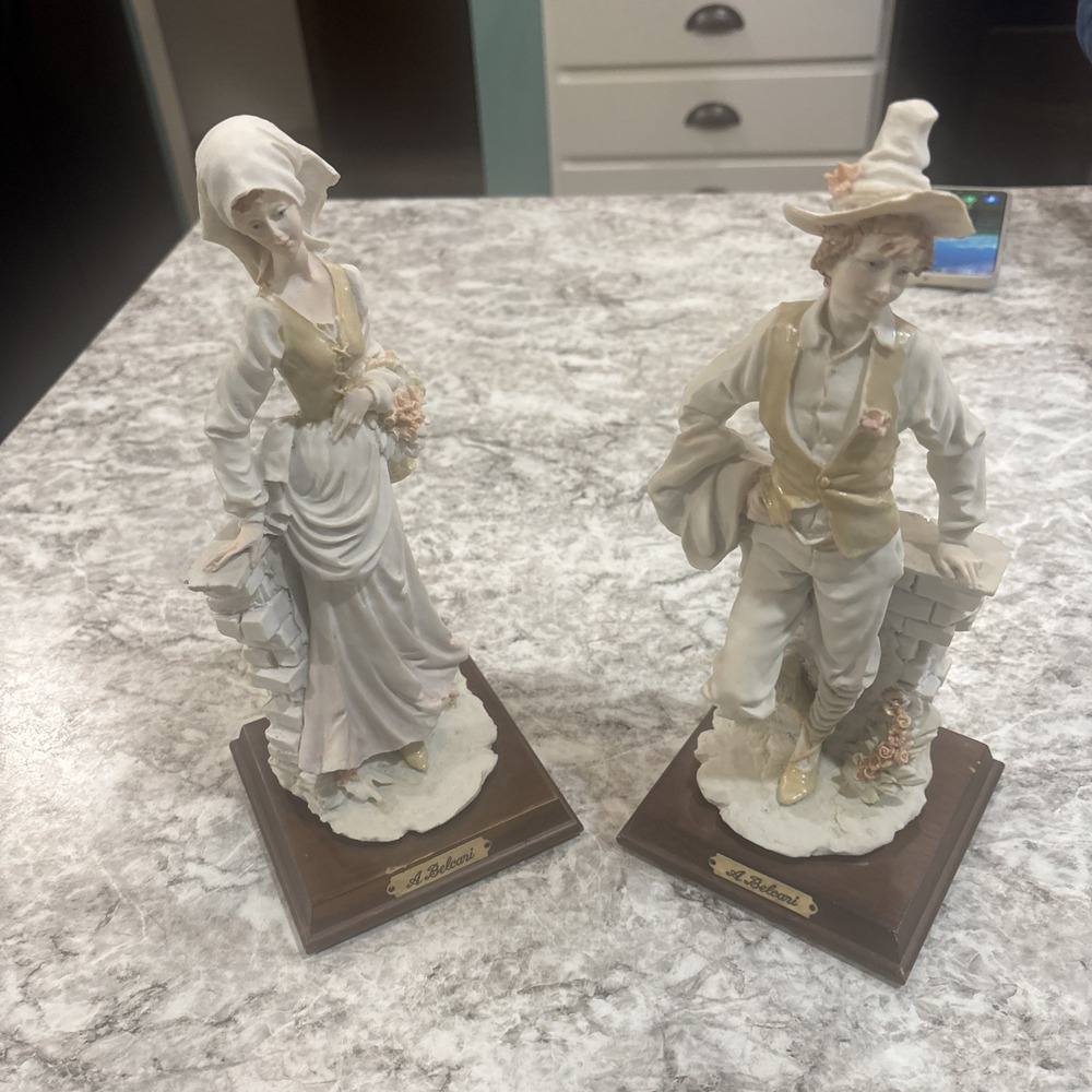 A Belcari Lady And‎ Man  11" Tall Figurine With Wood Base 1984